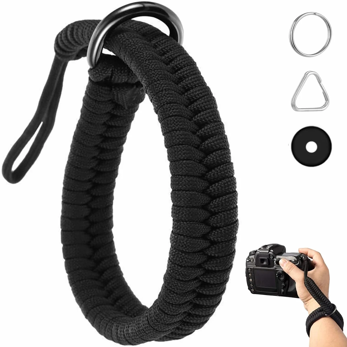 Dragonne Appareil Photo en Paracord 550, Noir Sangle de Poignet pour Appareil Photo, avec Anneaux en D, Compatible avec DSLR, Action Cam et Compact, Accessoire Sécurisé pour Photographie en Plein Air