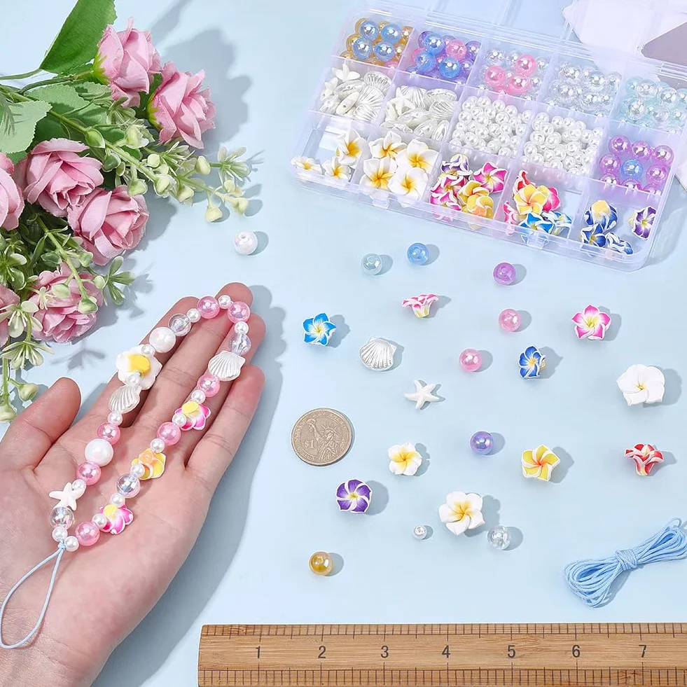 SUNNYCLUE 1 boîte de 228 pièces Kit de Création de 6 breloques pour Téléphone (Drapeau Cordon Perles en Forme D'Étoile de Mer Perles de Fleur de Frangipanier Perles de Fleur D'Été Perles de Fleur D'Ét