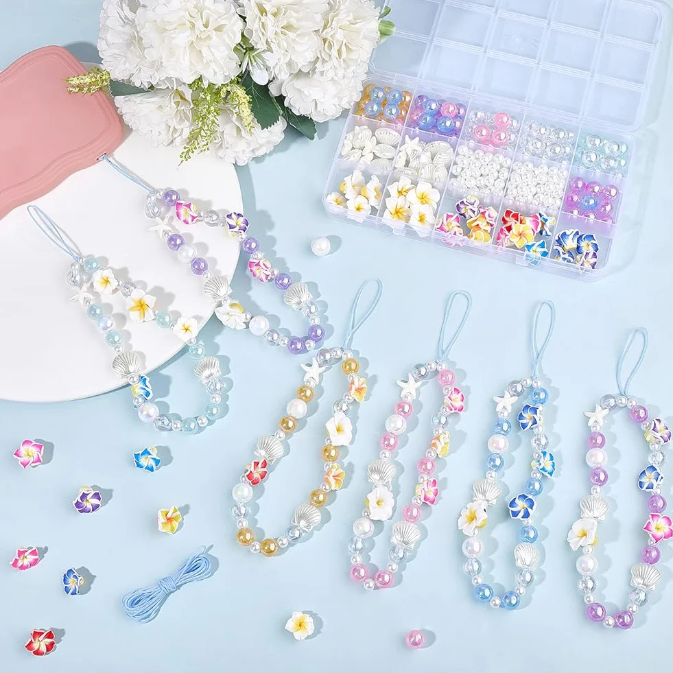 SUNNYCLUE 1 boîte de 228 pièces Kit de Création de 6 breloques pour Téléphone (Drapeau Cordon Perles en Forme D'Étoile de Mer Perles de Fleur de Frangipanier Perles de Fleur D'Été Perles de Fleur D'Ét